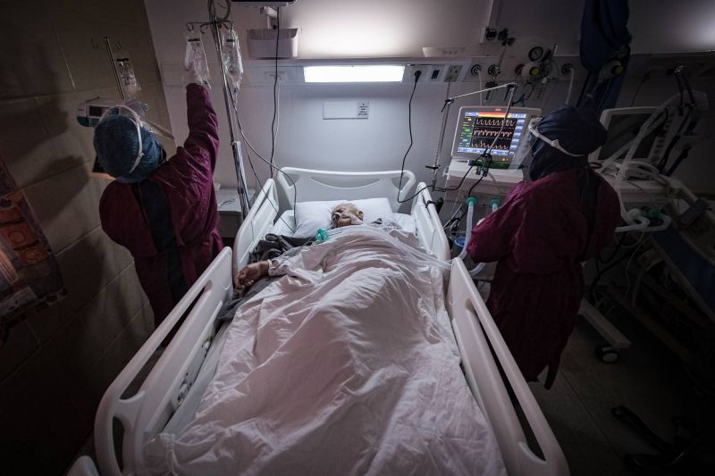 As hospitals hit capacity, coronavirus patients overflow into emergency rooms