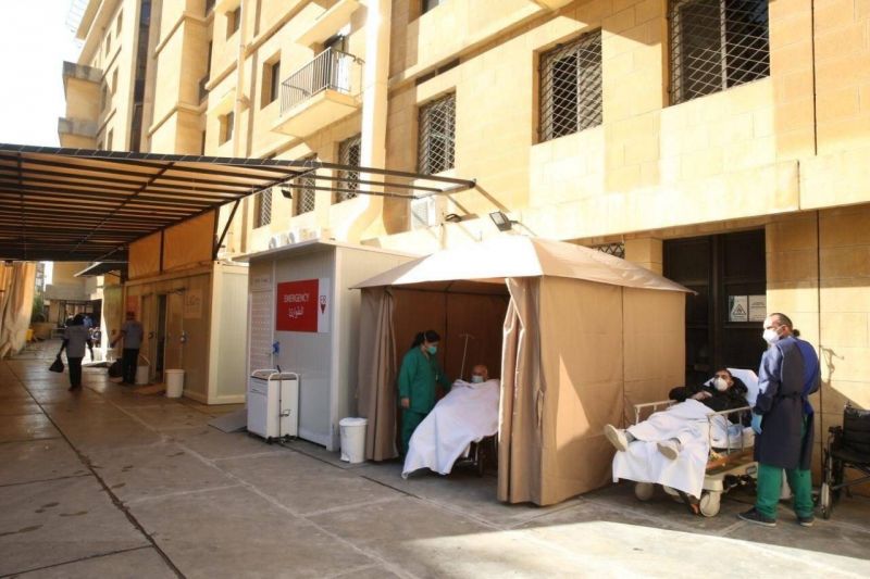 Hospital treats COVID-19 patients in its parking lot as space, equipment and personnel challenges persist across much of Lebanon