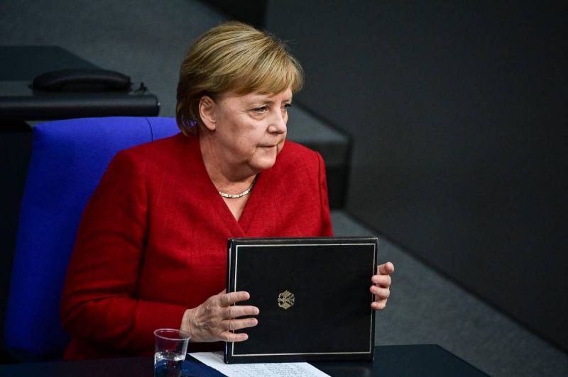 Pour Merkel, la communauté internationale doit continuer de 