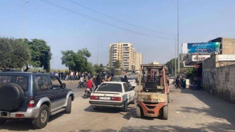 Residents of Tripoli have blocked roads in protest over power cuts and water shortages