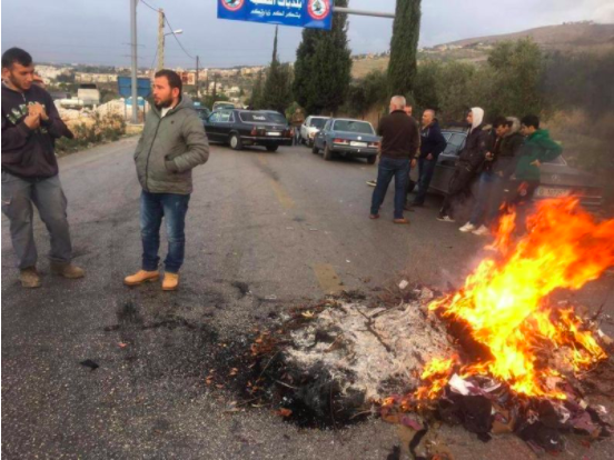 Protesters block roads around Lebanon as labor strike kicks off