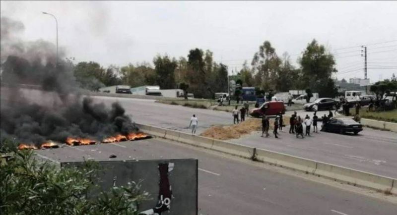 Protestors block roads in Sarafand to protest arrest of suspect accused of shooting in the air to intimidate opposition candidates