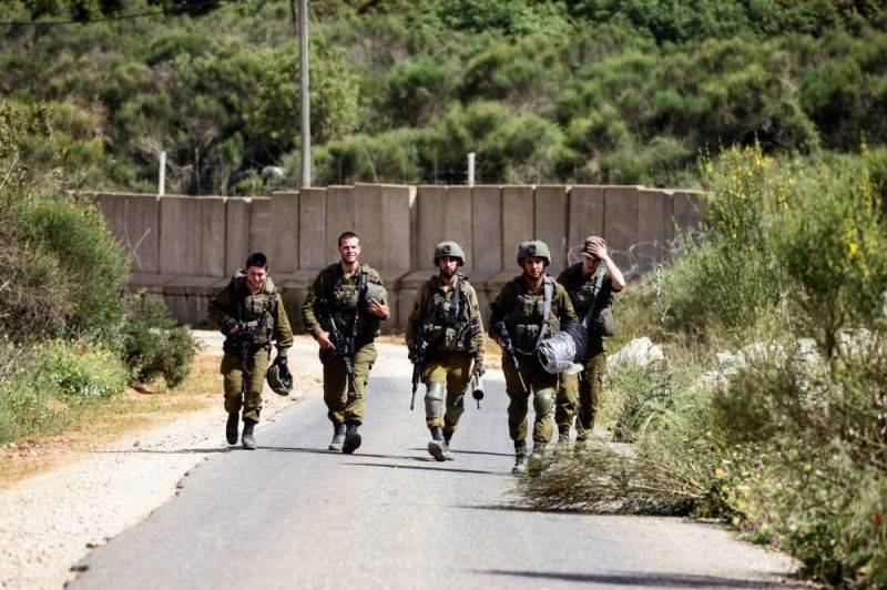 Israeli army says it has seized weapons, hand grenades on southern border