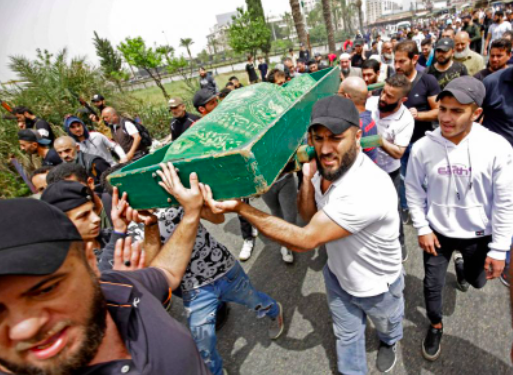 Tripoli tragedy survivor: 'I promised my children a better life, and now they are dead'