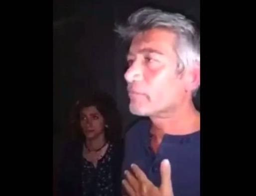 Activist accused of accosting energy minister turns himself in to police Activist accused of accosting energy minister turns himself in to police
