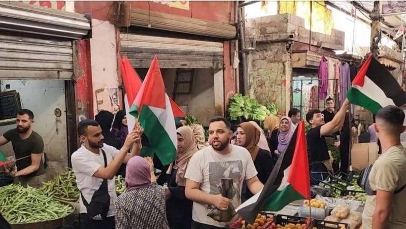 Palestinian flags fly in Saida in response to Israeli 'flag march' in Jerusalem