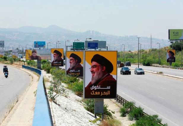Le Hezbollah et Amal priés de retirer les affiches partisanes sur la route de l'aéroport