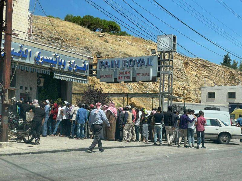 Endless queues and quarrels at bakeries as bread shortage takes hold Endless queues and quarrels at bakeries as bread shortage takes hold