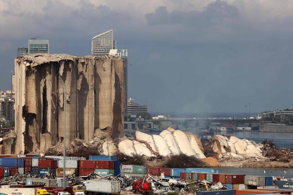 Port blast victims' families hold sit-in to demand silo fires be extinguished Port blast victims' families hold sit-in to demand silo fires be extinguished