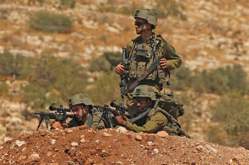 Two Palestinian gunmen, Israeli army officer killed in shootout