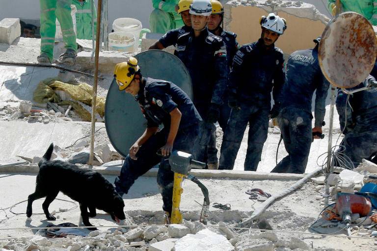 'Miracle' in Amman as baby pulled alive from collapsed building 'Miracle' in Amman as baby pulled alive from collapsed building