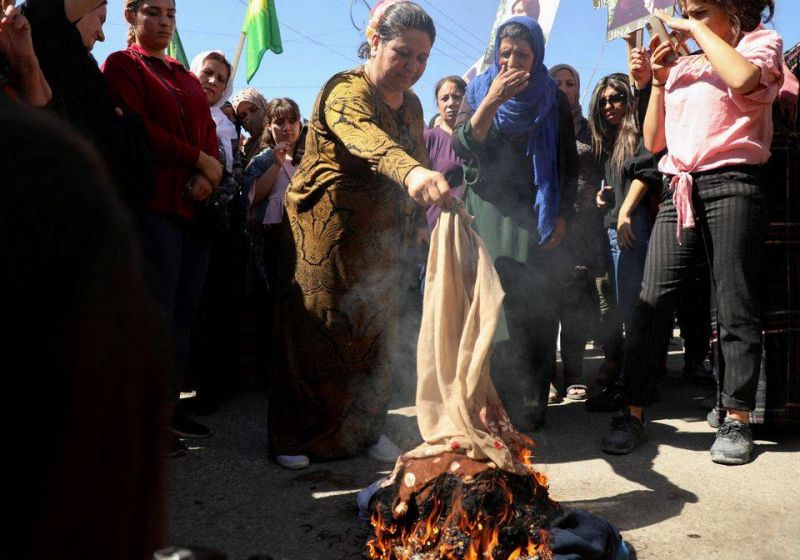 In Syrian north, women protest over death of Iran's Amini