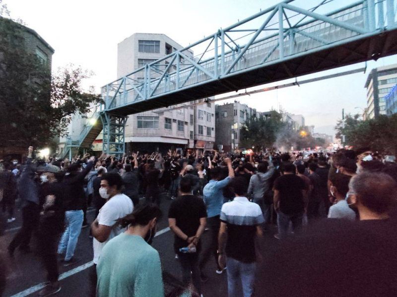 Iranian protesters set fire to police station as unrest over woman's death spreads