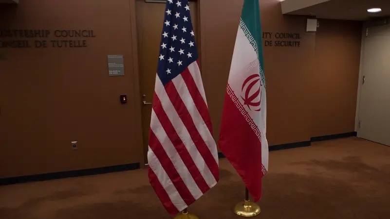 American held In Iran allowed to leave, son freed from detention