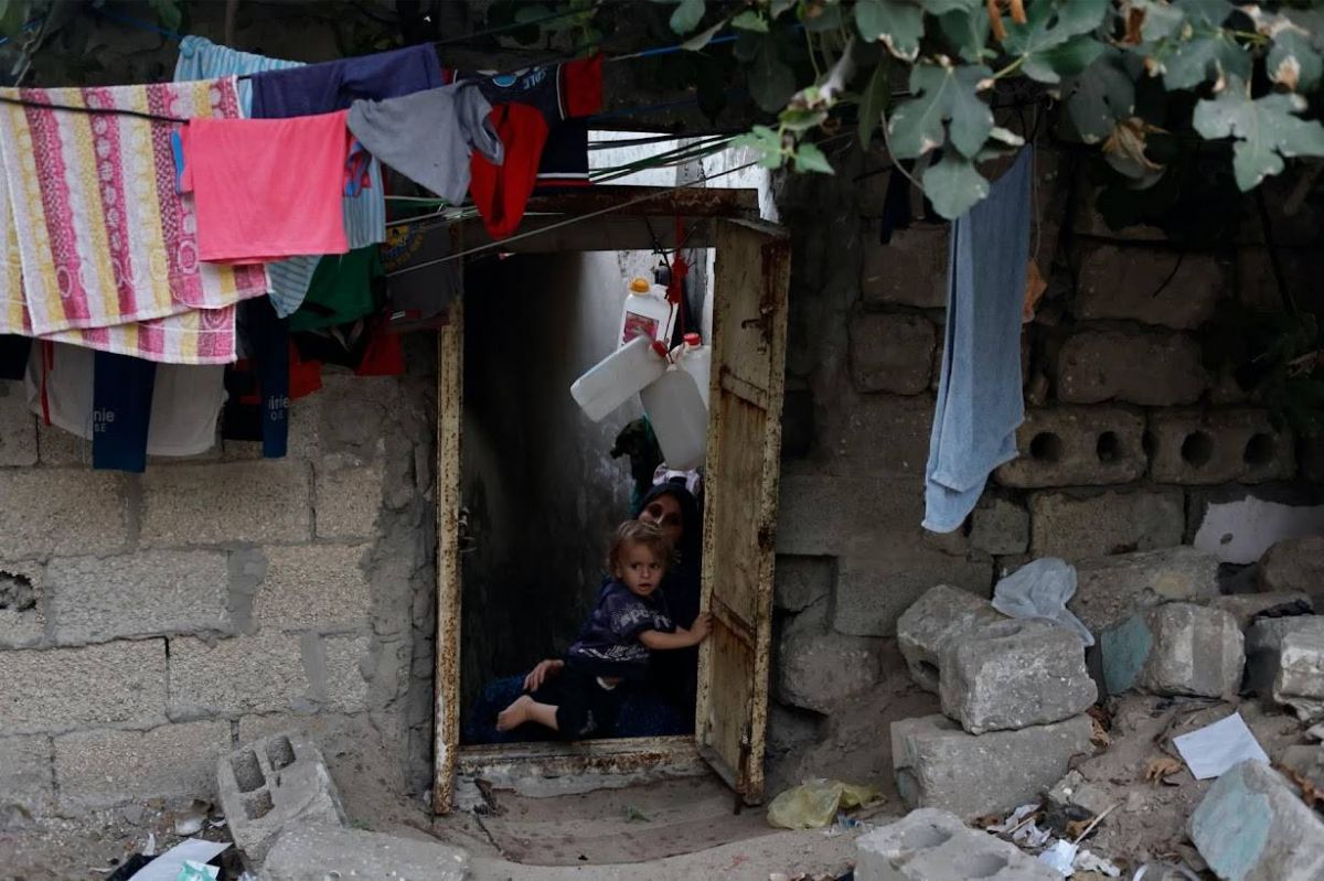 Gaza struggles to accommodate the living and the dead as population grows