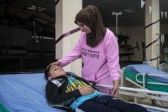 Mother and son at the makeshift clinic in Bebnine. (Credit: João Sousa/L'Orient Today)