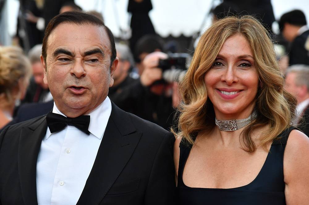 L'ancien patron de Renault-Nissan et son épouse Carole lors du Festival de Cannes, en 2017. Photo d'archives AFP