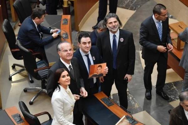 MPs protest in darkened Parliament, lira falls below LL50,000, blast victims’ portraits erased: Everything you need to know to start your Friday