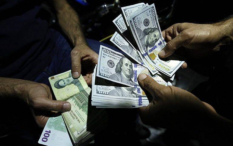 Iran's currency falls to record low as sanctions continue
