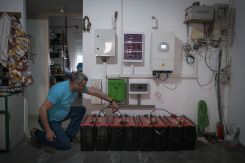 Bassem El Khoury installed a wind turbine on his roof last year, in part to help power a machine that milks his cow. Feb. 14, 2023. (Credit: João Sousa/L’Orient Today)