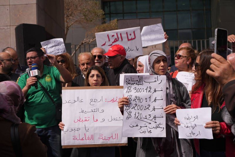 Public school teachers demonstrate in Beirut against lifting of strike