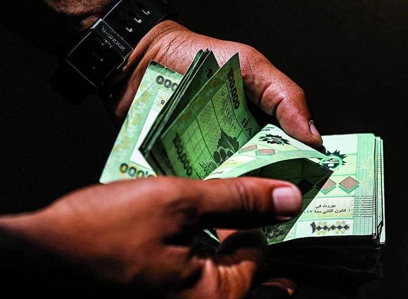 Lebanese lira hits new record low of LL110,000 against dollar on parallel market