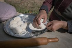 Randa mart Ali prepares dough for a batch of tannour-baked manaeesh near Hakkour, Akkar. (Credit João Sousa)