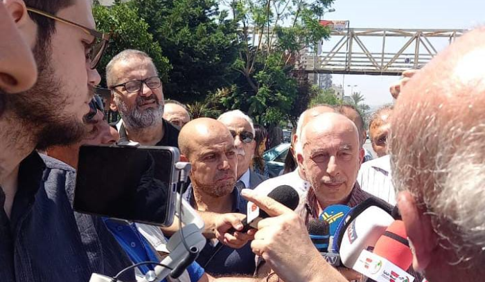 Public admin employees begin two-week strike, threaten to escalate