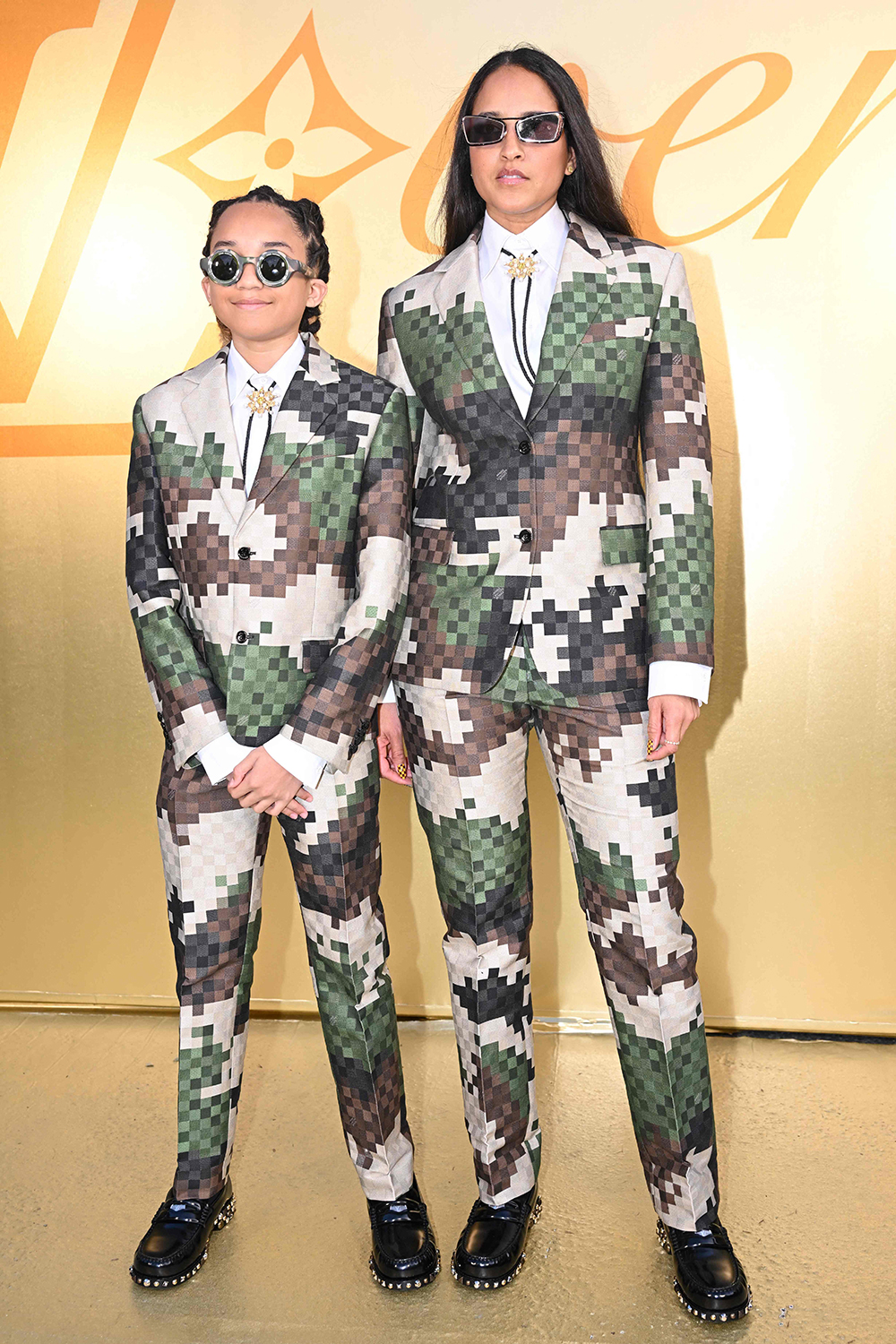 Pharrell Williams Rocket Williams and Helen Lasichanh attend the Sacai, WireImage