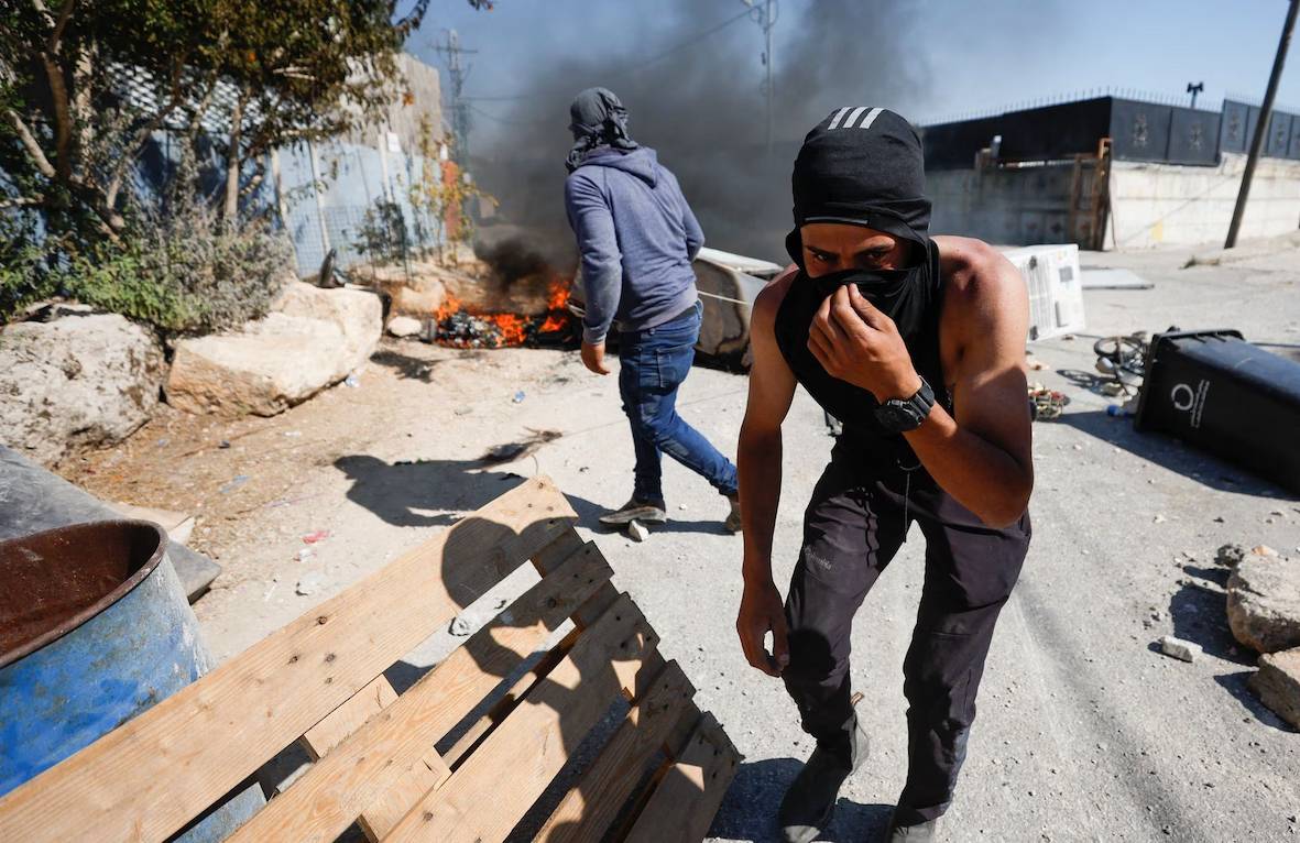 Palestinian teen shot dead after Israeli police allege he opened fire at Israeli checkpoint