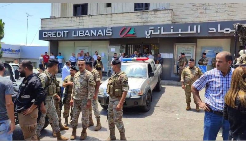 Depositors obtain their savings after holding up two banks in Chouf, South Lebanon
