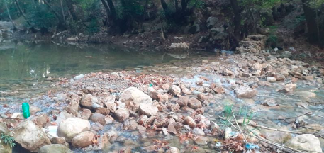 A barrier on Damour River cuts off water to local residents before being dismantled