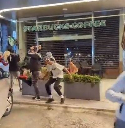 Pro-Palestine and Hezbollah supporters vandalize AUB, Starbucks and McDonalds in Lebanon