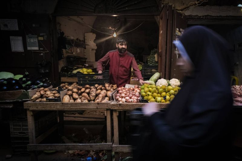 In Tripoli’s sprawling flea market, shopkeepers rebuild alone after fire