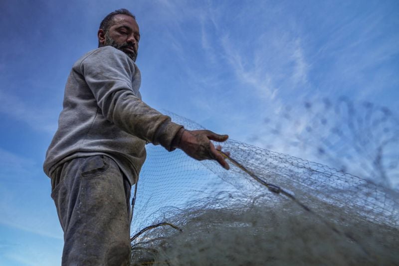 Amid Israeli shelling, southern Lebanon’s fishermen search troubled waters for their daily catch