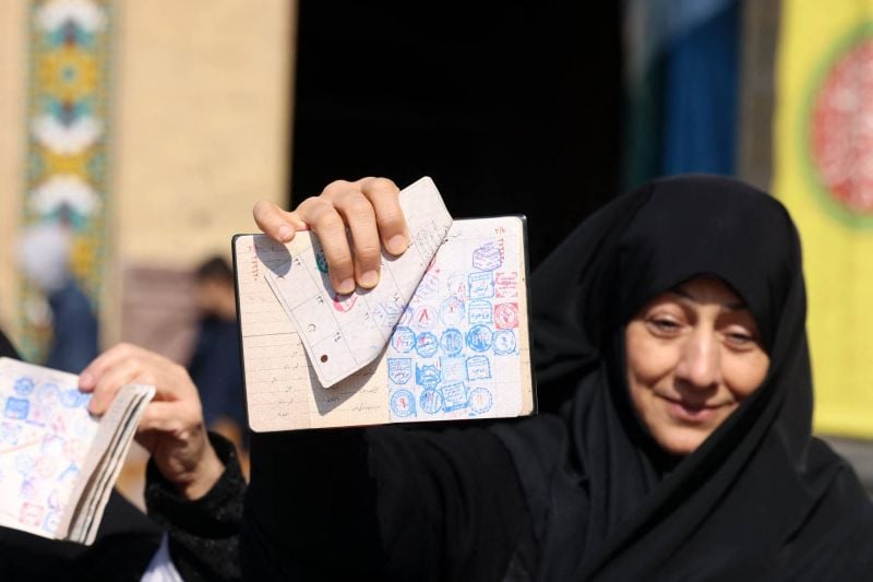 Iranians vote in elections as conservatives expected to dominate