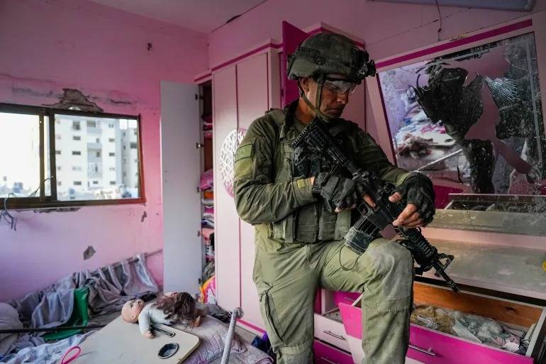 'He opened my jewelry box and stuffed my rings into his pocket': Israeli soldiers looting in Gaza under scrutiny