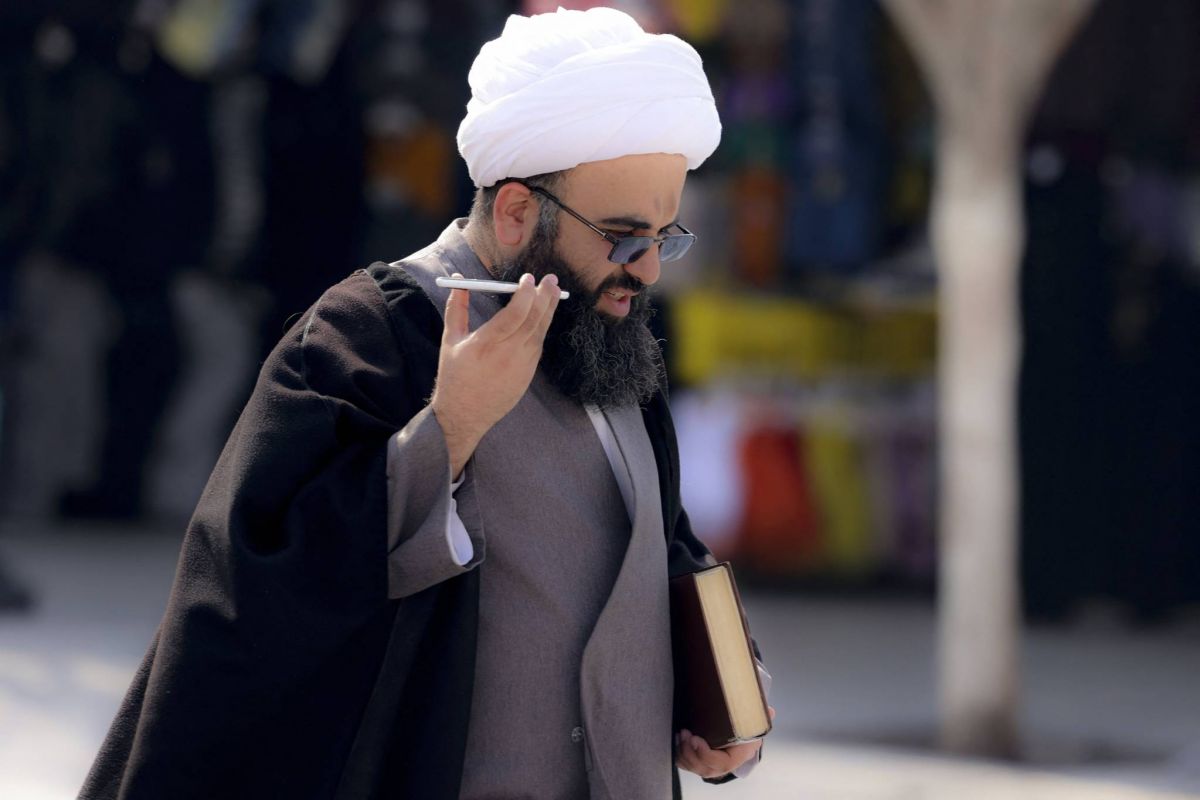 Iran arrests four over footage of woman's row with cleric