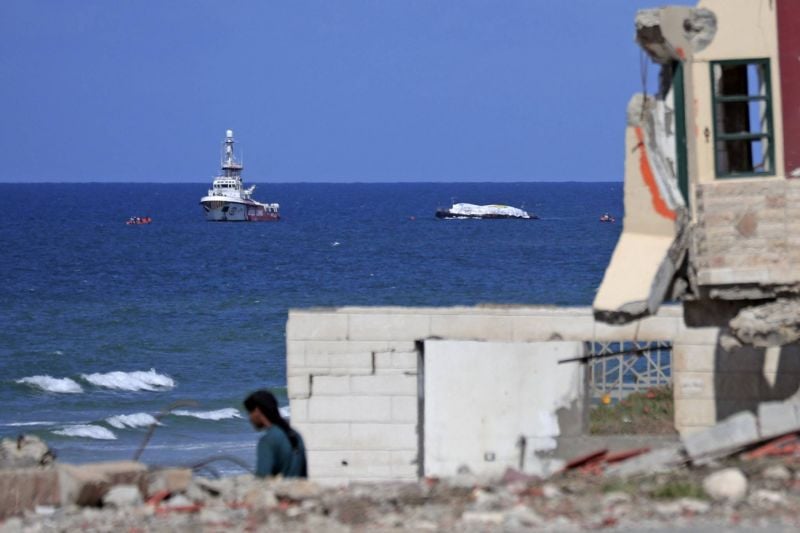 L'aide humanitaire arrivée par bateau à Gaza a commencé à être déchargée
