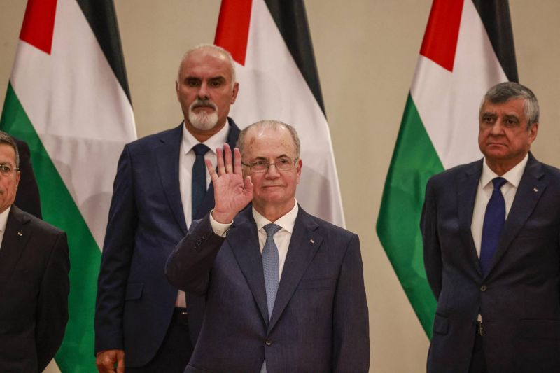 New Palestinian government gets wary greeting
