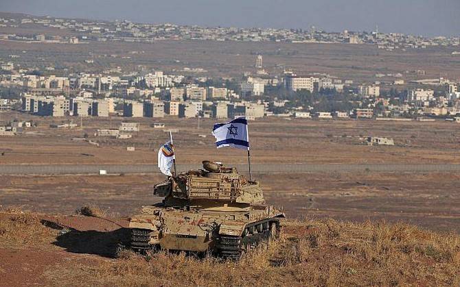 Israel strikes Syria after rocket fire on annexed Golan