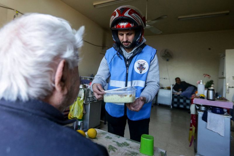 Born to help: Syria bikers deliver Ramadan meals