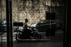A man drives his motorcycle in Beirut, April 24, 2024. (Credit: João Sousa/L'Orient Today)