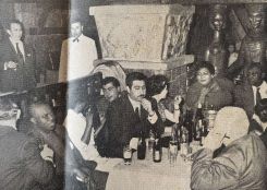 Louis & crew enjoying a night at legendary Caves du Roy (from left to right) unknown, Louis Armstrong, Lucille Armstrong, unknown, unknown, Cecile Geammal, Velma Middleton, Unknown.