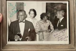 (from left to right) Louis Armstrong, Mrs McClintock, Lucille Armstrong, Robert M. McClintock.