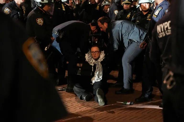 Police arrest protesters at Columbia University as student anti-war protests spread Police arrest protesters at Columbia University as student anti-war protests spread