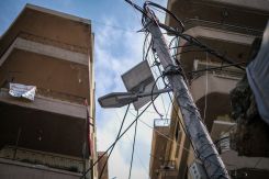 A solar panel recently installed on the street dividing the Tripoli neighborhoods of Jabal Mohsen and Bab al-Tabbaneh. Feb. 21, 2024. (Credit: Joao Sousa/L'Orient Today)