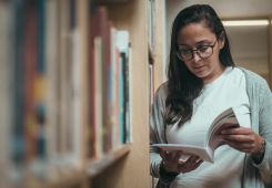 AIF director Rana Nasser Eddin in the foundation’s library, a specialized collection for the general public — plus AC and free wifi. (Credit: João Sousa/L’Orient Today)