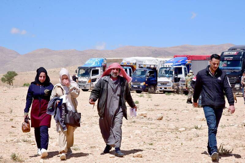 What risks do Syrians returning home face?