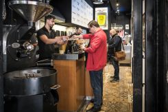 Customers purchase fresh ground coffee at Café Younes in Hamra. Beirut, 2024. (Credit: Joao Sousa/L'Orient Today) 